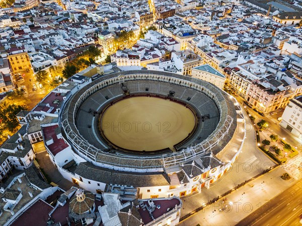 Bullring of the Real Maestranza de Caballeria surrounded by white architecture in Sevilla