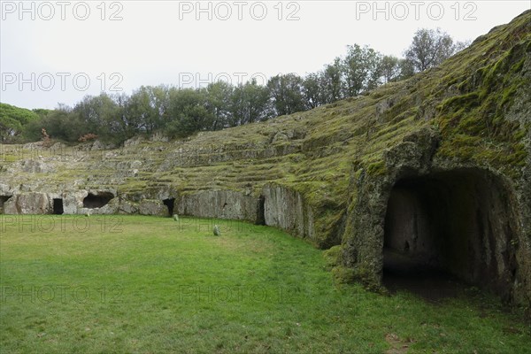 Roman amphitheatre carved out of the tufa