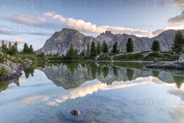 Morning atmosphere at the lake Lago de Limides and Tofana di Rozes