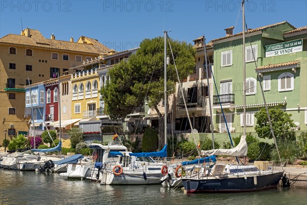 Yachts and colorful houses