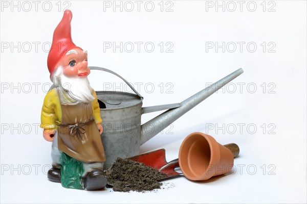 Garden gnome and garden tools