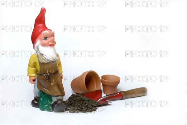 Garden gnome and garden tools