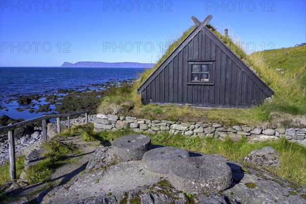 Grinding stones in front of the Osvoer Fishery Museum