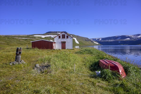 Rowing boat and old dwelling house