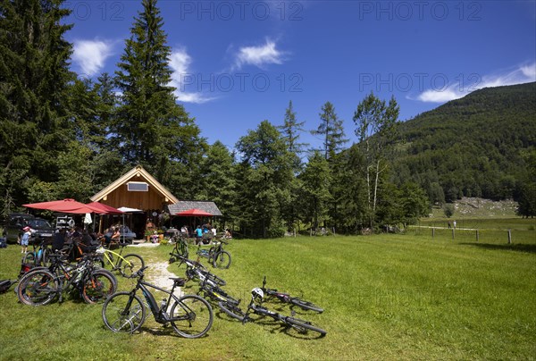 Mountain bikes standing in front of the Moosalm near the Schwarzensee