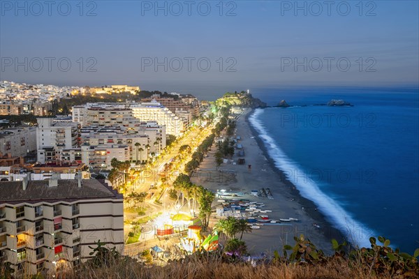 Panorama of touristic illuminated coast in Almunecar at night