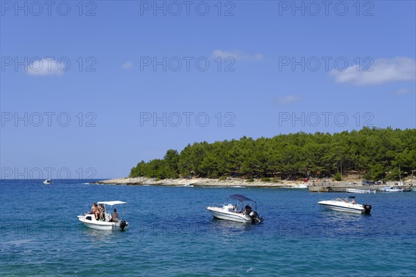 Boats in the sea on the coast