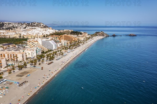 Aerial view of touristic coast in Almunecar by Mediterranean Sea