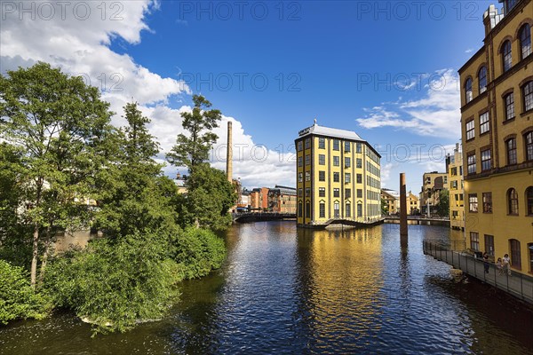 Former factory building Styrkjaern on the island of Laxholmen in the Motala stroem river