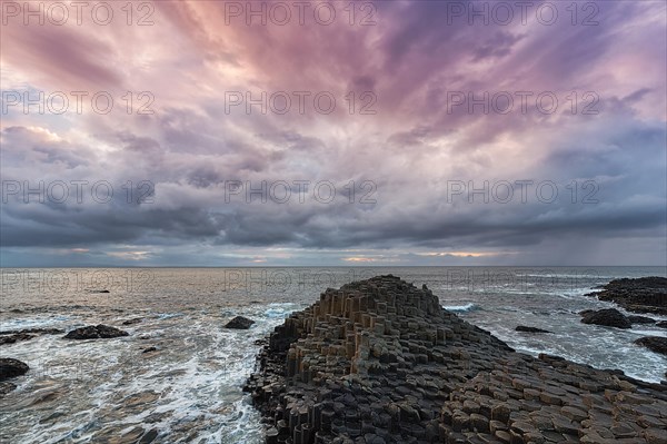 Coast with basalt columns in the evening