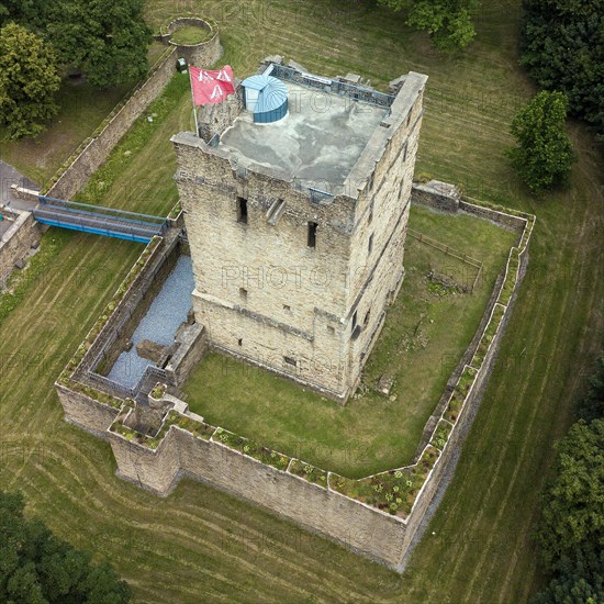 Fortified castle tower of ruin of partly reconstructed former moated castle Burg Altendorf from the Middle Ages