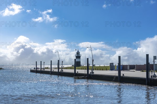 Coastal landscape with the Kleiner Preusse lighthouse in the background