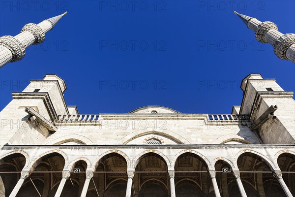Inner courtyard facade with portico and minarets