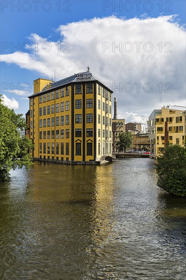 Former factory building Styrkjaern on the island of Laxholmen in the Motala stroem river