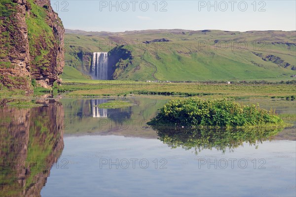 Masses of water plunge vertically into the depths