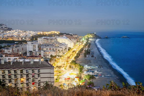 Panorama of touristic illuminated coast in Almunecar at night