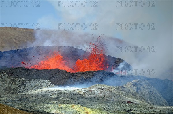 Sulphur fields in front of volcanic craters