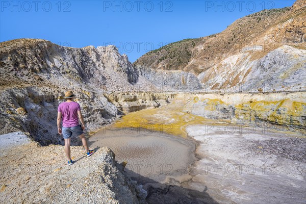 Young tourist at a crater