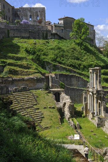Ruin of ancient Roman theatre on steep slope