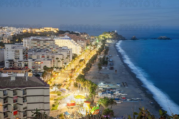 Panorama of touristic illuminated coast in Almunecar at night