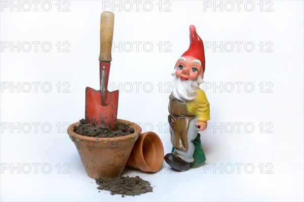 Garden gnome and garden tools