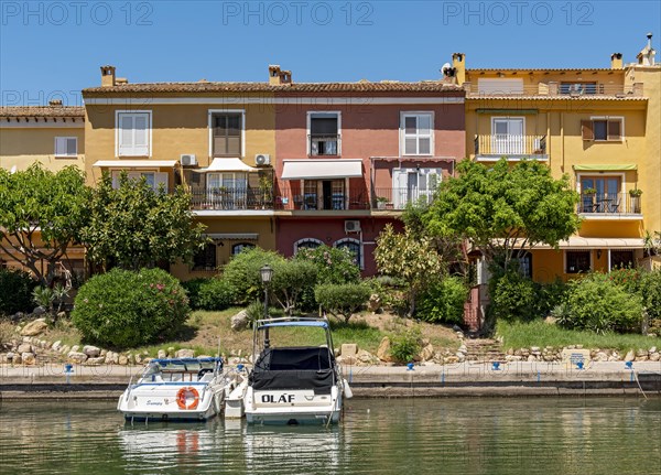 Yachts and colorful houses