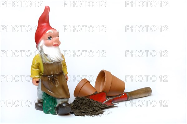 Garden gnome and garden tools