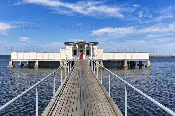 White cold bathhouse by the Baltic Sea