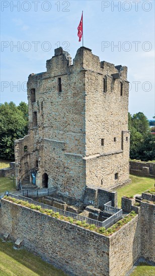 Fortified castle tower of partially reconstructed former moated castle Burg Altendorf from the Middle Ages