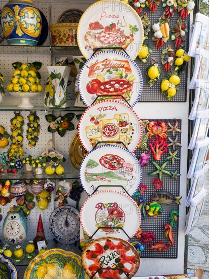 Colourfully painted pizza plates