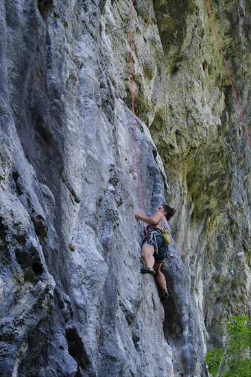 Climbing on a rock wall