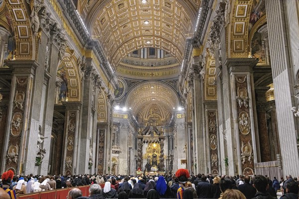 Pope celebrates Saint Mass in St Peter's Basilica in front of faithful Christians