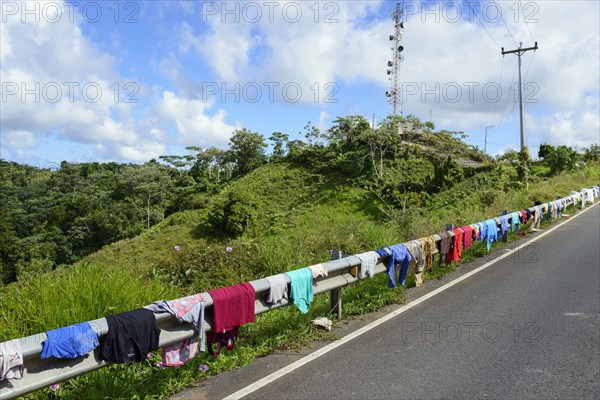 Laundry drying on guardrail