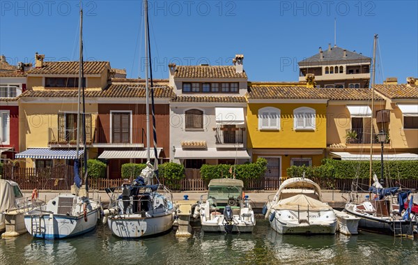 Yachts and colorful houses