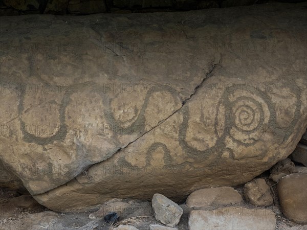 Rock engraving on Neolithic passage grave
