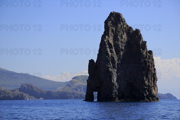 Rocks jutting out of the sea Faraglioni di Lipari at the southern tip of Lipari