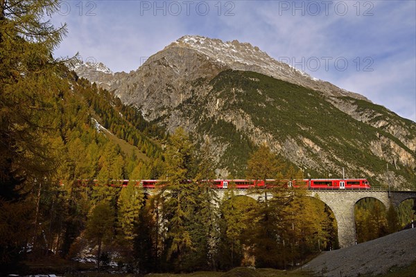 Rhaetian Railway crosses viaduct between Berguen and Preda