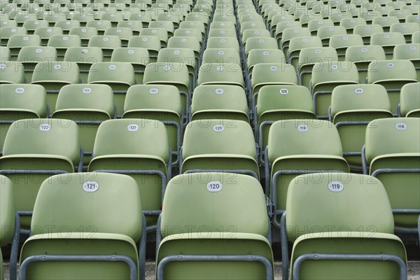 Green folding seats on the grandstand of the Seebuehne