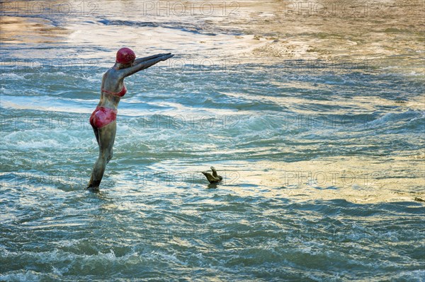 Woman statue diving in Vardar river