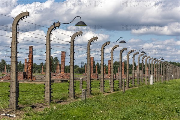 Barbed-wire fence and lamp-post at Auschwitz II-Birkenau concentration camp