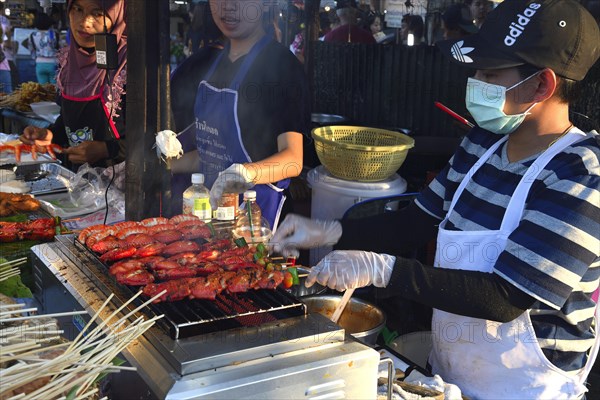 Various skewers with meat and seafood