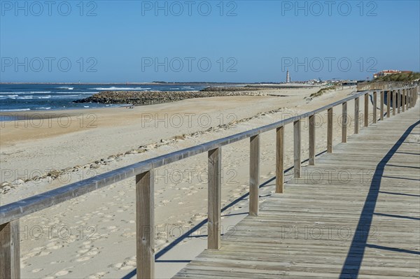 Wooden walkway on the beach Costa Nova