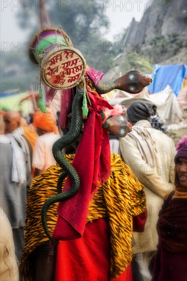 Snake charmer with cobra