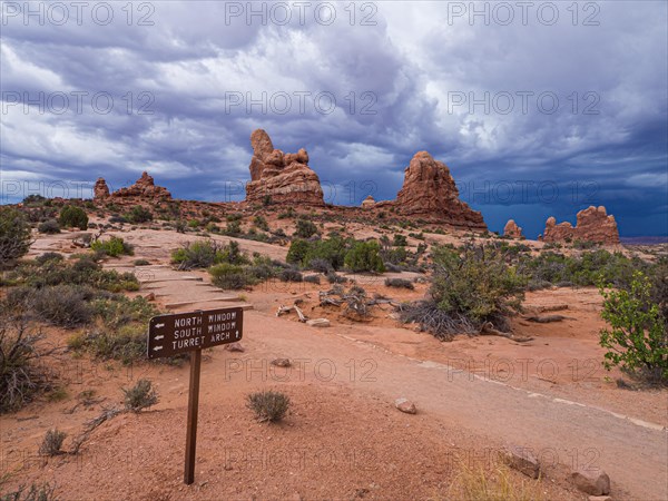 Thunderclouds over rock formations of the Windows Selection