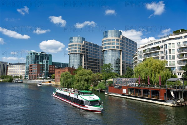 Excursion boat on the river Spree at Spreebogenpark in Berlin Moabit