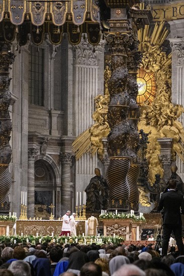 Pope celebrates Saint Mass in St Peter's Basilica in front of faithful Christians