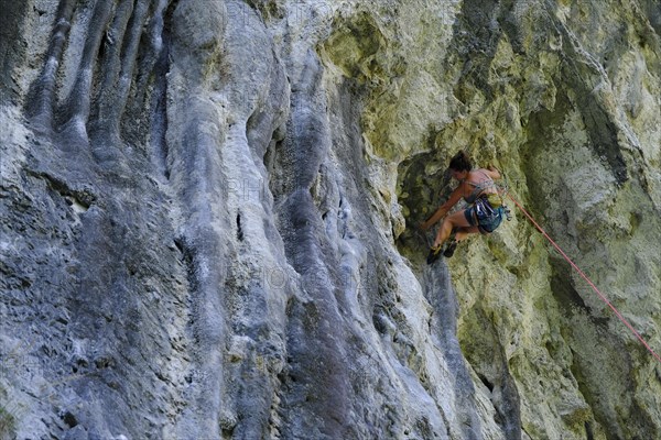 Climbing on a rock wall