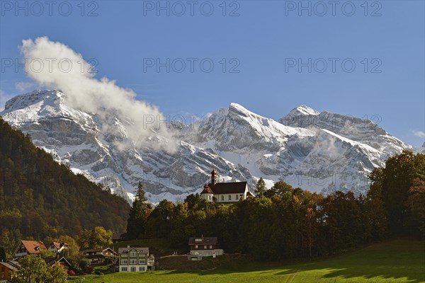 Flueeli Ranft Chapel in front of Alpine panorama