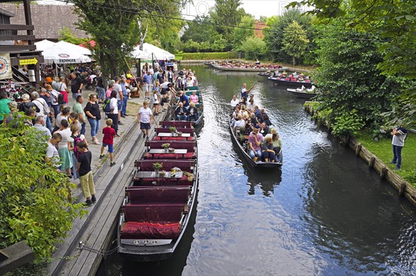 Tourists in Spreewald barges in the village of Lehde