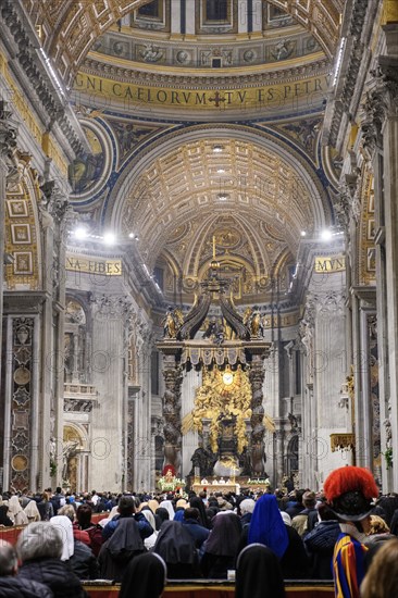 Pope celebrates Saint Mass in St Peter's Basilica in front of faithful Christians